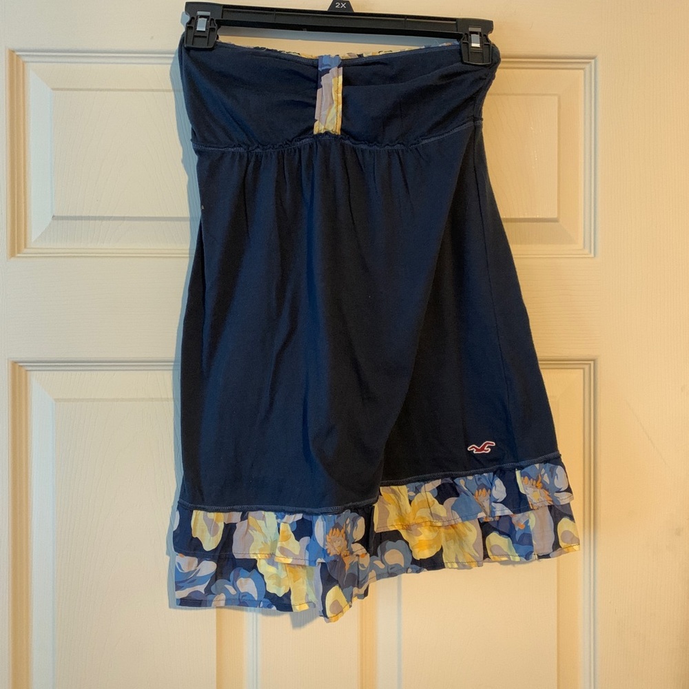 Hollister navy strapless shirt with yellow floral print at bottom